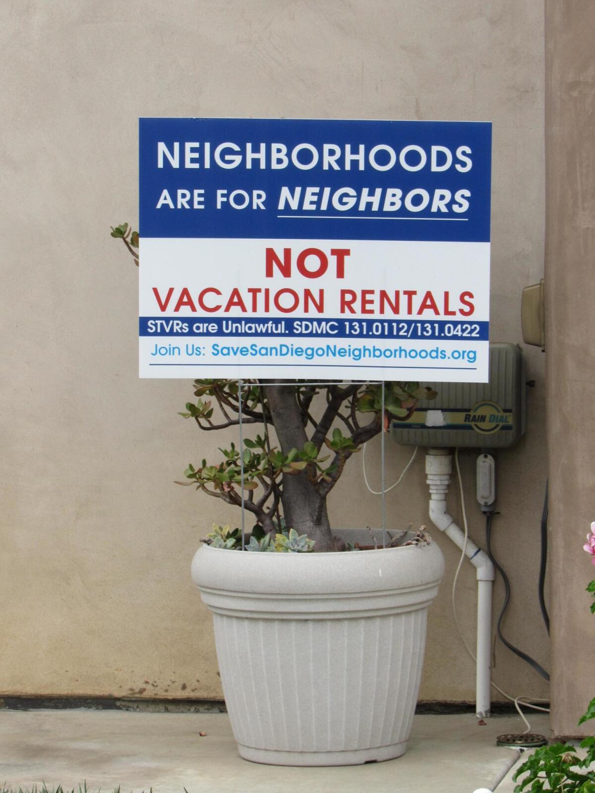 Signs like this have popped up across La Jolla and other areas in recent years in opposition to short-term vacation rentals. 