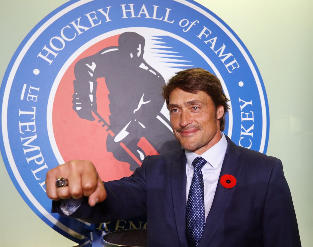 Teemu Selanne poses for photos at the Hockey Hall Of Fame and Museum on Nov. 10, 2017, in Toronto.