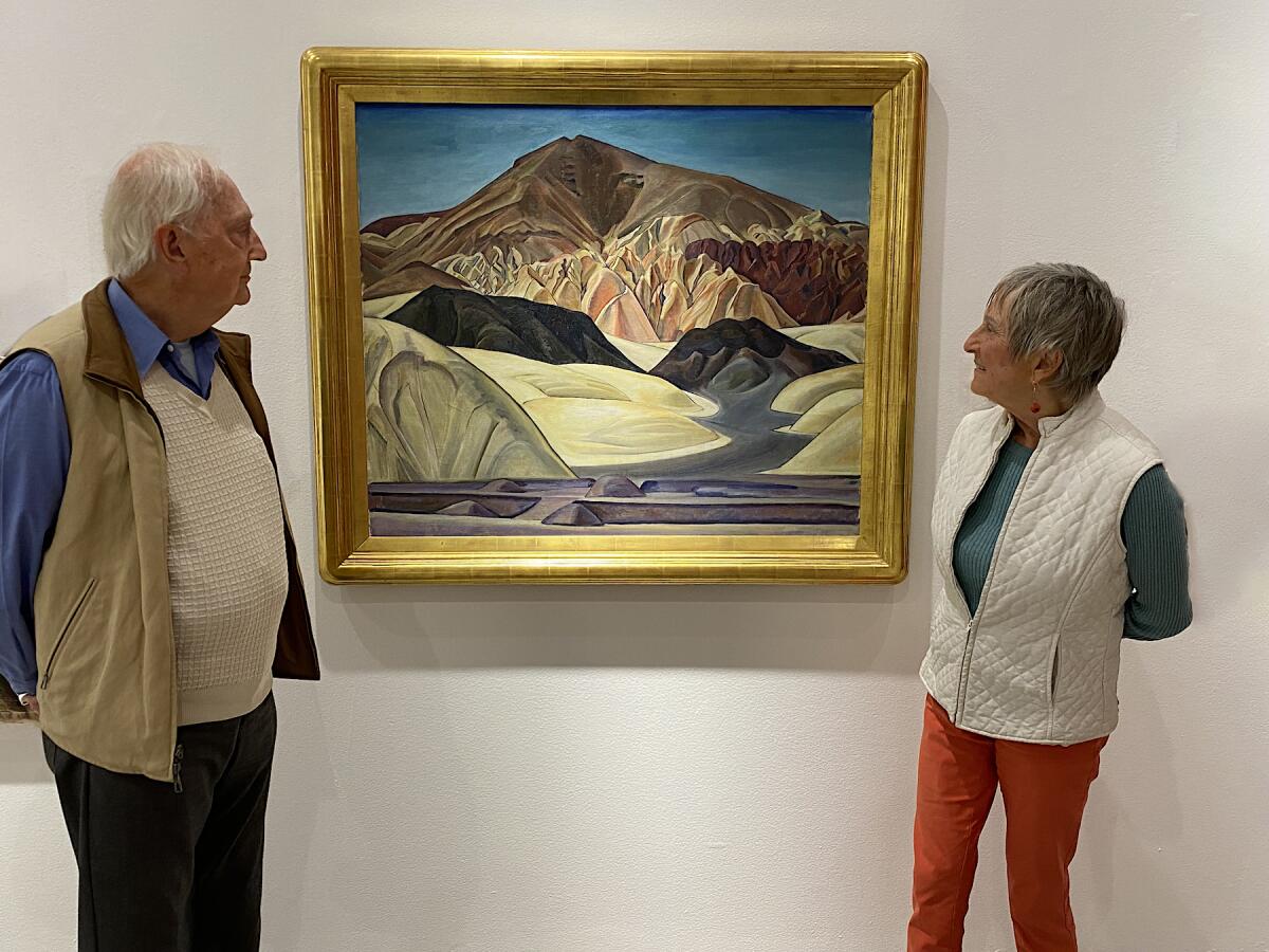 The Dijkstras with “A Vale In Death Valley” by Helen Forbes (1939). 