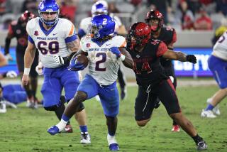 San Diego, CA - September 22: Boise State running back Ashton Jeanty (2) runs the ball against San Diego State linebacker Vai Kaho (44) during their game at Snapdragon Stadium on Friday, Sept. 22, 2023 in San Diego, CA. (Meg McLaughlin / The San Diego Union-Tribune)
