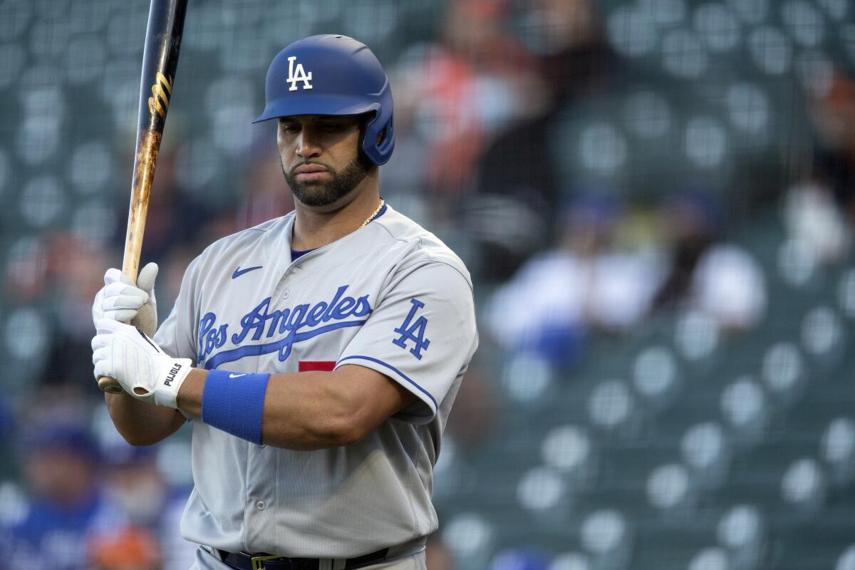 Dodgers first baseman Albert Pujols bats against the San Francisco Giants on May 21.