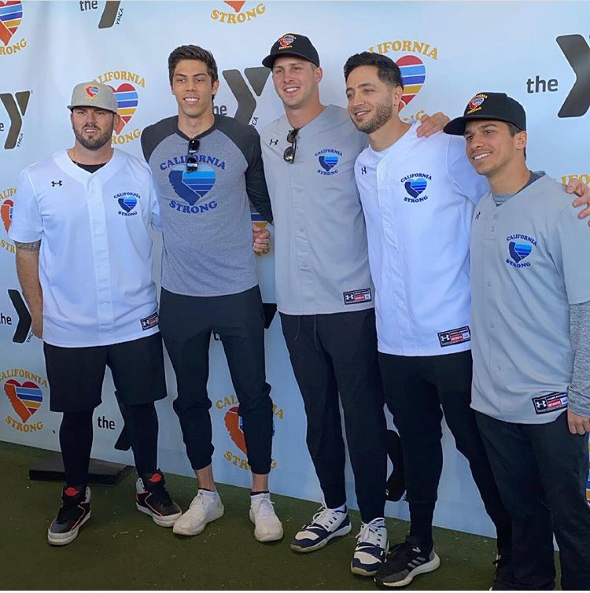 Mike Moustakas, Christian Yelich, Jared Goff, Ryan Braun and Mike Attanasio pose at a California Strong charity event.