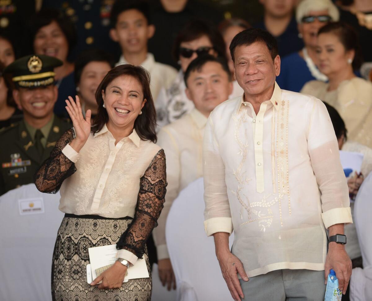 Philippine Vice President Maria Leonor “Leni” Robredo with President Rodrigo Duterte in July 2016.