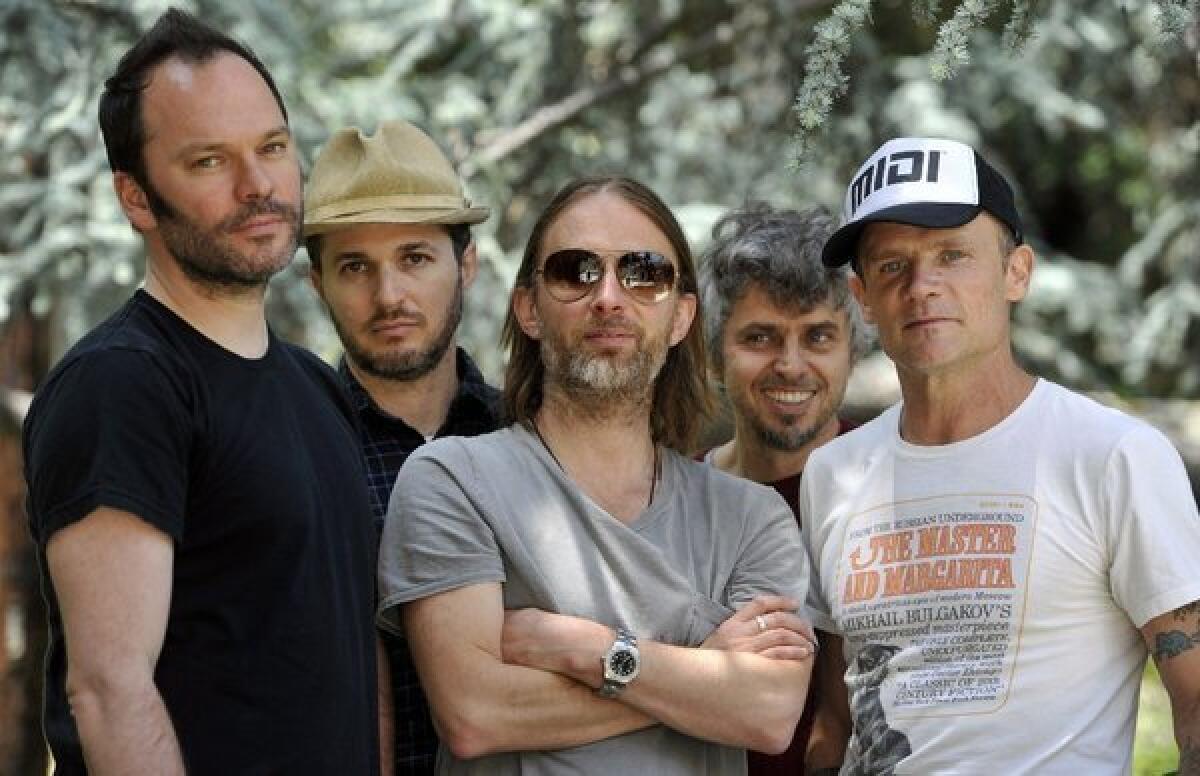 Members of Atoms For Peace, from left: Nigel Godrich, Joey Waronker, Thom Yorke, Mauro Refosco and Flea posing for a portrait in Los Angeles.