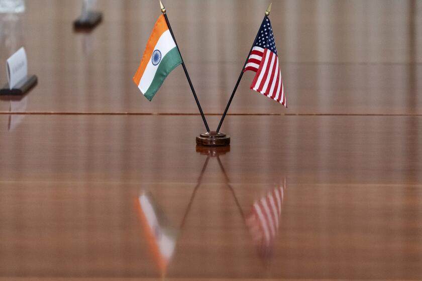 FILE- The countries' flags are seen on the table during a meeting with India's Foreign Minister Subrahmanyam Jaishankar and U.S. Secretary of Defense Lloyd Austin at the Pentagon, Monday, Sept. 26, 2022, in Washington. India has set up a high-level inquiry after U.S. authorities raised concerns with New Delhi that its government may have had knowledge of a plot to kill a Sikh separatist leader Gurpatwant Singh Pannun on American soil, an Indian official said on Wednesday, Nov. 29, 2023. (AP Photo/Alex Brandon)