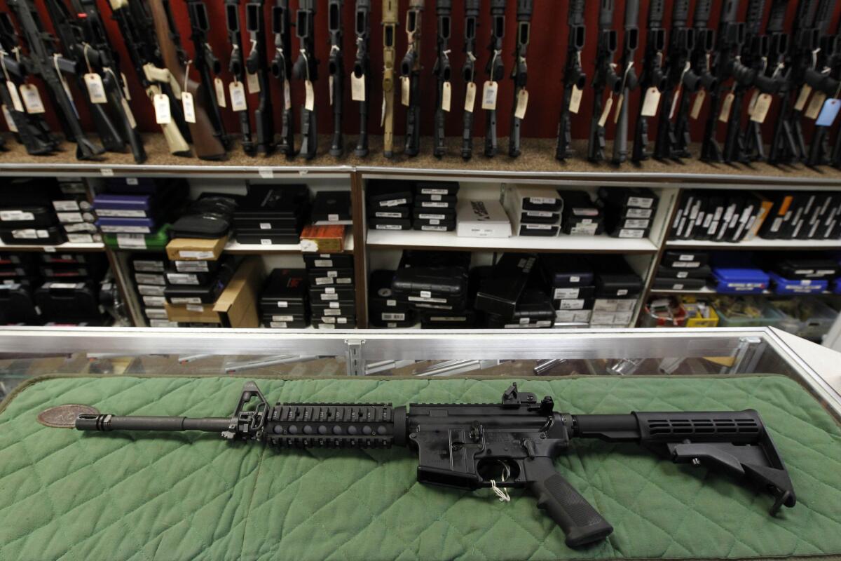 An AR-15-style rifle is displayed at an indoor range and gun shop in Colorado in 2012.