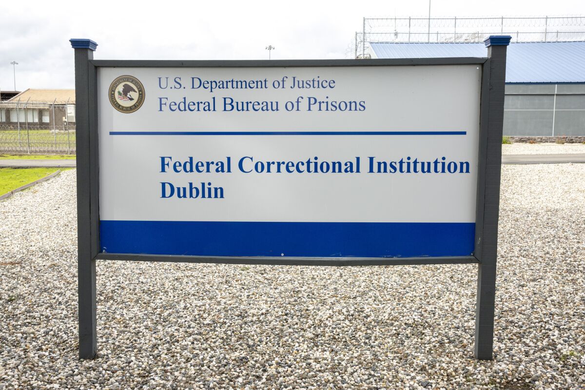 FILE - A sign for the Federal Correctional Institution Dublin is displayed on Jan. 9, 2019, in Dublin, Calif. A government watchdog has found a “substantial likelihood” the federal Bureau of Prisons committed wrongdoing when it ignored complaints and failed to address asbestos and mold contamination at the federal women’s prison that has already been under scrutiny for rampant sexual abuse of inmates. (Santiago Mejia/San Francisco Chronicle via AP, File)