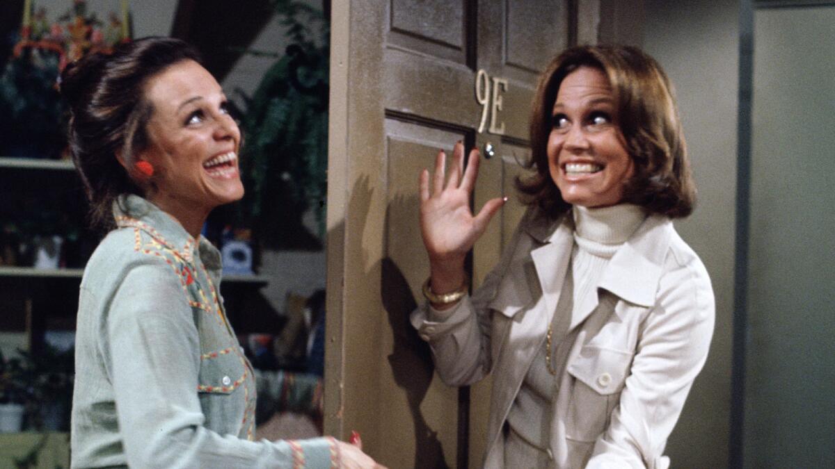 Valerie Harper, left, greets Mary Tyler Moore at the door on "Rhoda."