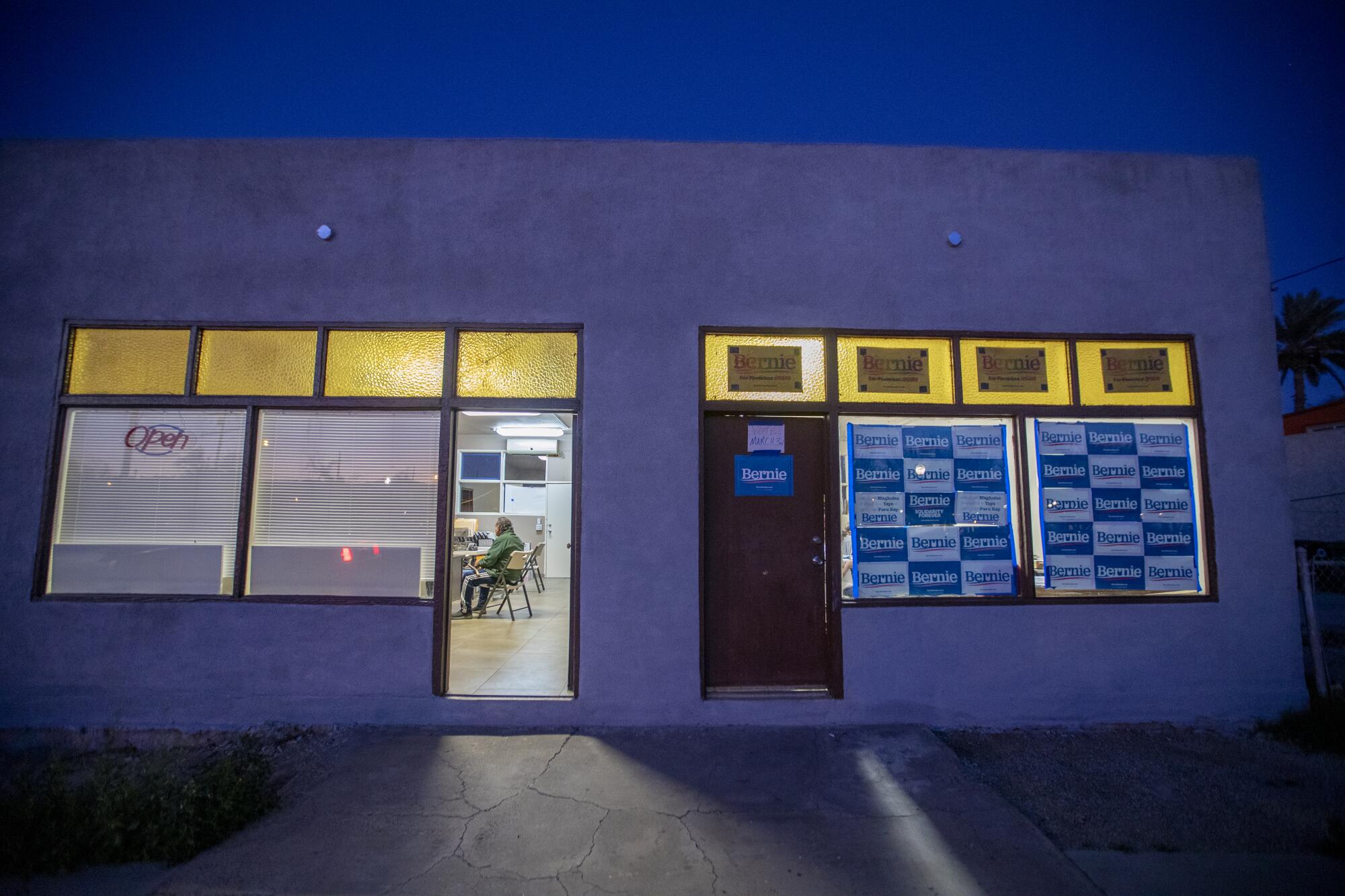 Volunteers work inside the Bernie Sanders campaign headquarters in downtown Coachella.