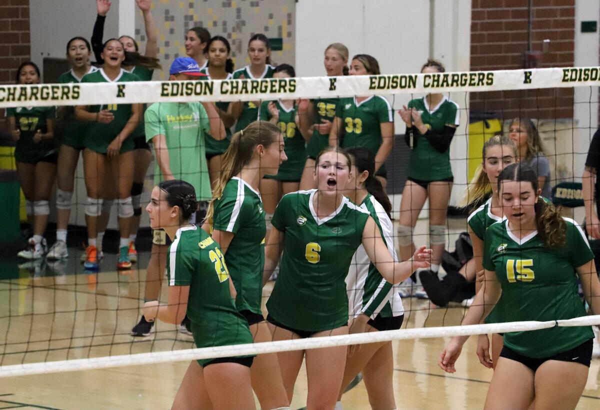 The Edison girls' volleyball team celebrates a point against Vista Murrieta on Saturday.