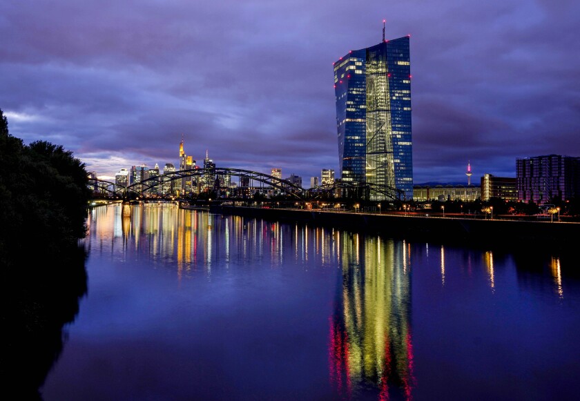 File---File picture taken Oct.6, 2021 shows the European Central Bank at the river Main in Frankfurt, Germany. A senior European Central Bank official says that raising interest rates prematurely could “choke off the recovery,” comments that come as inflation in the 19-nation euro area has hit a record rate. (AP Photo/Michael Probst,file)