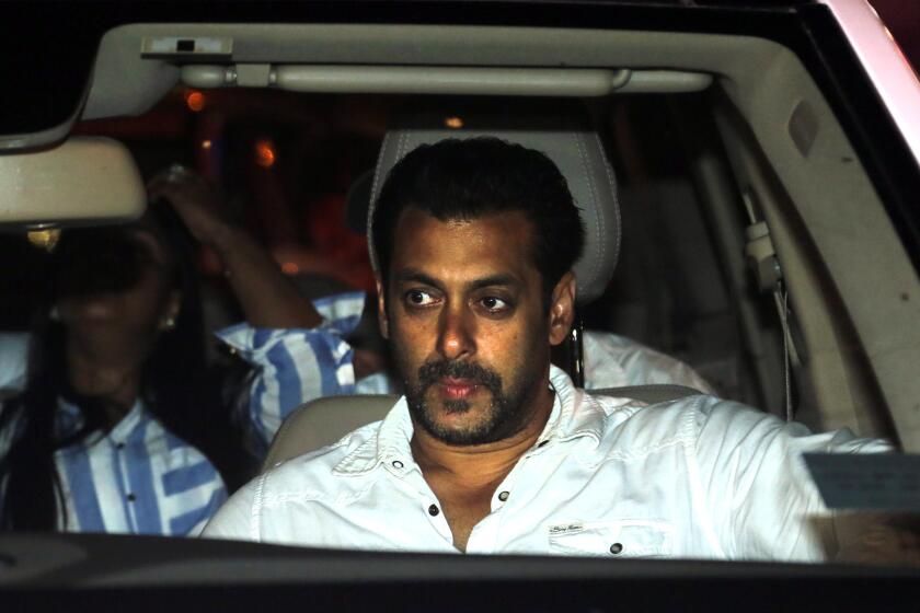 Indian actor Salman Khan leaves a Mumbai court on Wednesday after getting two days' interim bail. The Bollywood star was convicted of culpable homicide in a 2002 hit-and-run case and was sentenced to five years in prison.