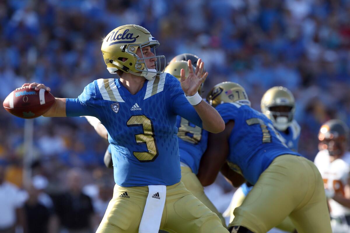 UCLA quarterback Josh Rosen tosses a pass early in the first quarter against Arizona State at the Rose Bowl.