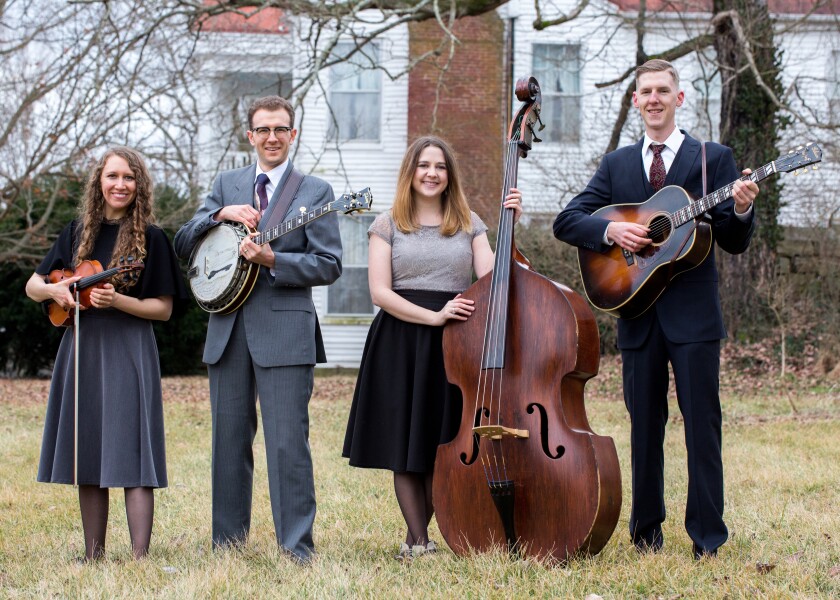 Violinist Corrina Rose Logston (left) and banjo player Jeremy Stephens (second from left) are husband-and-wife musicians. The other members of their award-winning bluegrass band, High Fidelity, are bassist Vickie Vaughn and guitarist Daniel Amick.