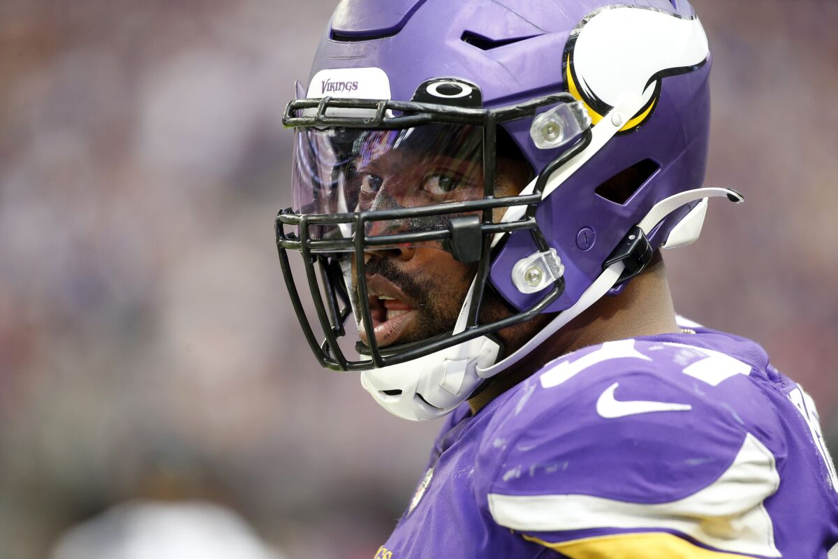 Minnesota Vikings defensive end Everson Griffen stands on the field 
