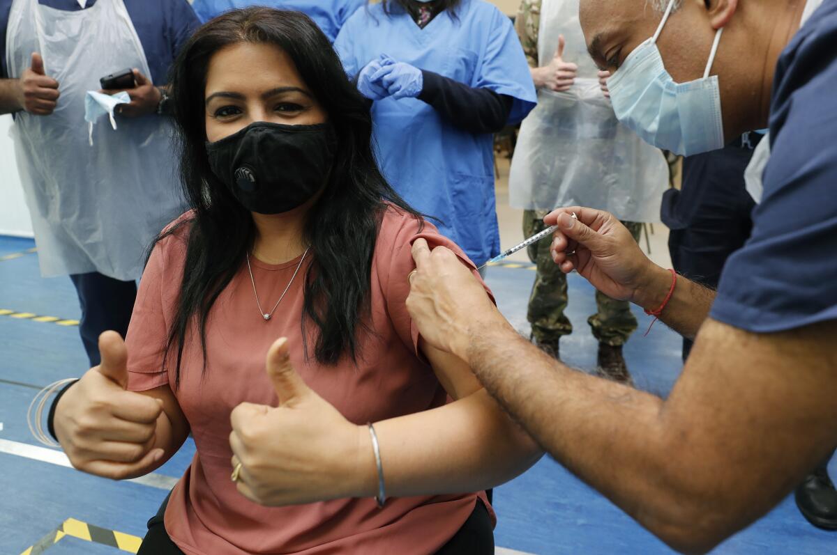 Woman receiving COVID-19 vaccination