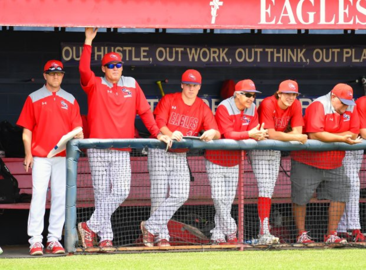 Former Angels great Tim Salmon, second from left, looks on during a Scottsdale Christian Academy game.