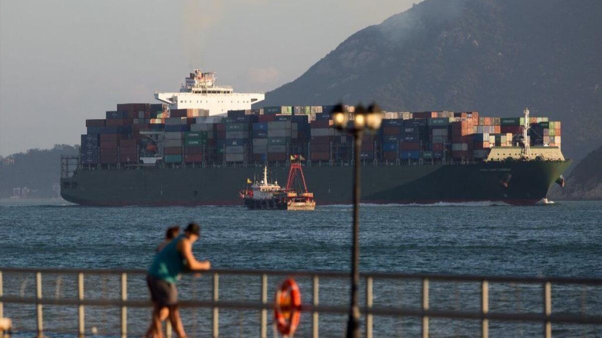 A containership sails through Hong Kong's West Lamma Channel on Sept. 18.