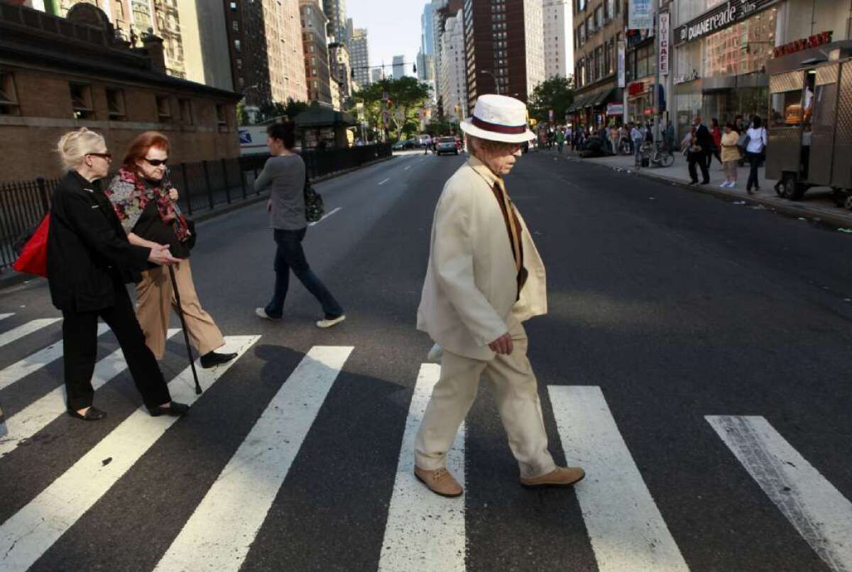 Older people crossing a street