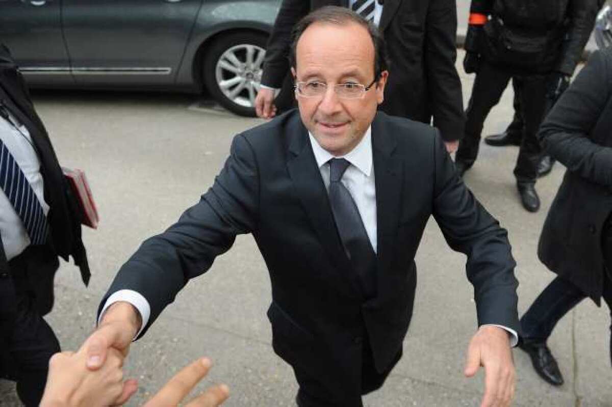 President-elect of France Francois Hollande speaks to supporters as he leaves the Socialist Party headquarters on May 7 Paris. He promised to make small changes to France's austerity plans while doing more to promote economic growth.