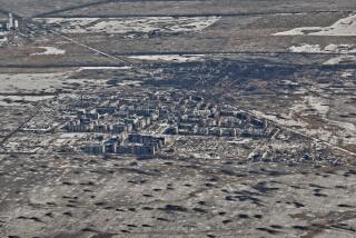 FILE - An aerial view of Vuhledar, the site of heavy battles with the Russian troops in the Donetsk region, Ukraine, Feb. 10, 2023. (AP Photo/Libkos, File)