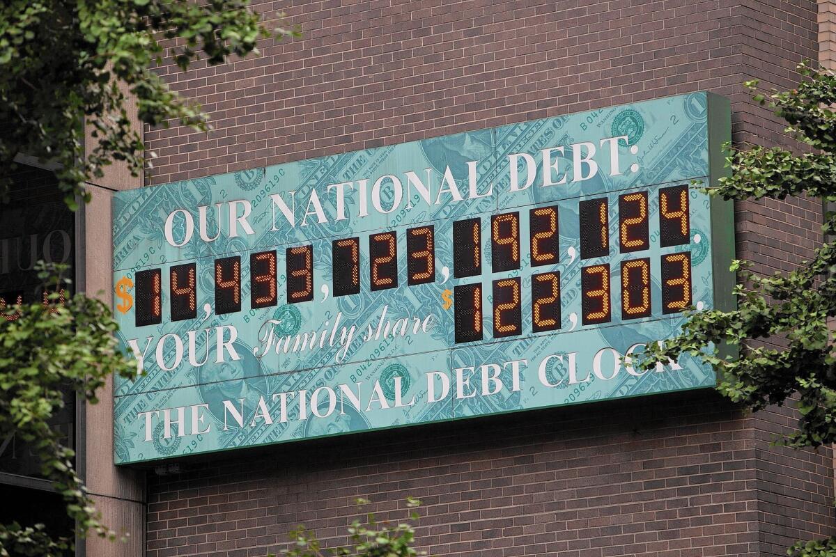 Treasury Secretary Jacob J. Lew has warned Congress that it needs to increase the $18.1-trillion debt limit by Nov. 3 or risk a federal government default. Above, a display in New York showing the rising U.S. debt in 2011.