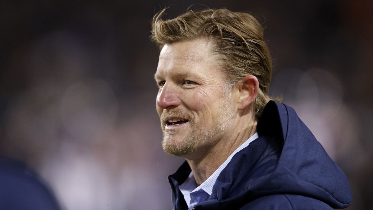 General Manager Les Snead of the Rams watches warm-ups prior to the game against the Chicago Bears at Soldier Field on December 9, 2018 in Chicago, Illinois.