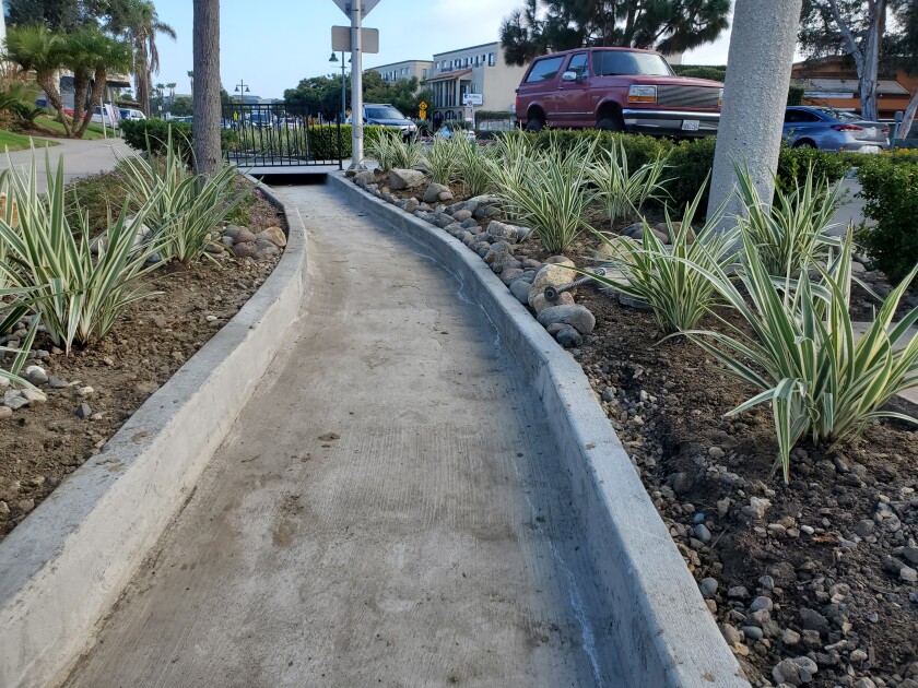 A new drainage swale at Forward Street and La Jolla Boulevard is meant to reduce winter flooding that creates "Lake Forward."