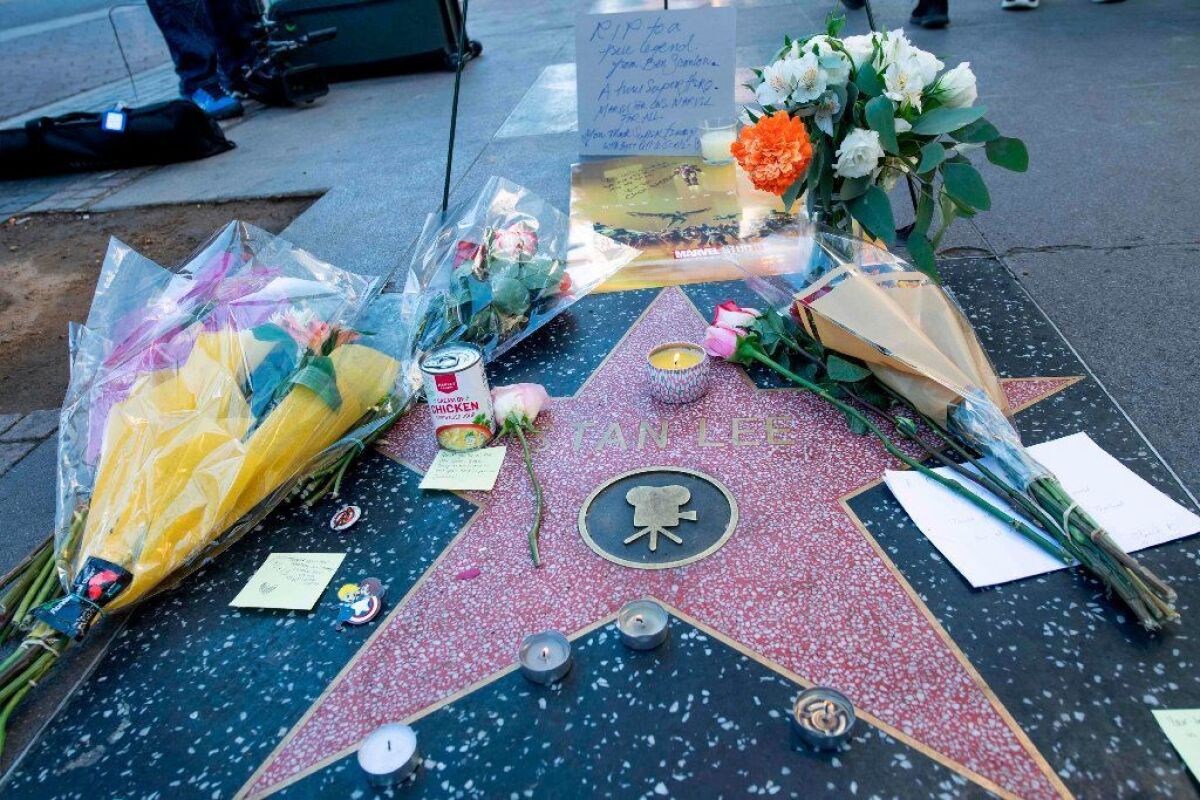Fans left tributes on comic book legend Stan Lee's star on the Hollywood Walk of Fame shortly after the news of his death.