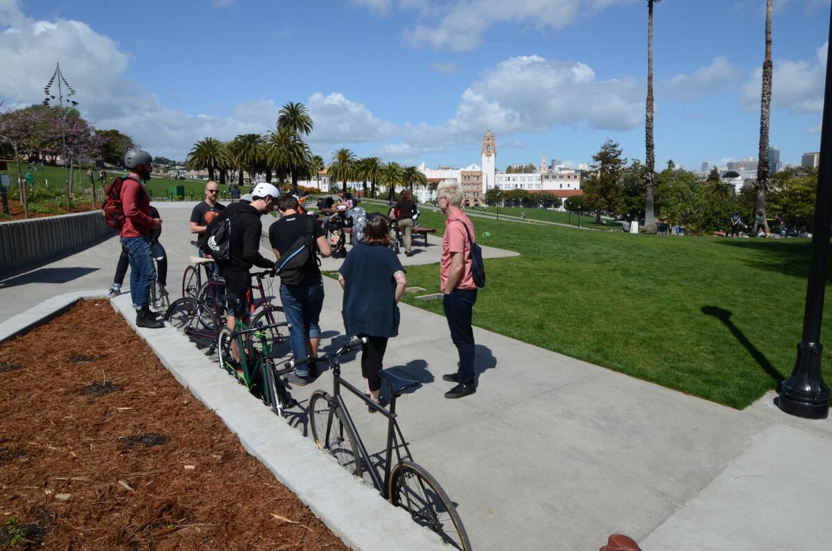 Cyclists in San Francisco's Mission Dolores Park.