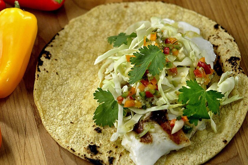 Pile the fish into warm tortillas with plenty of shredded cabbage and a fresh tangy lime-garlic vinaigrette. Recipe: Grilled halibut tacos
