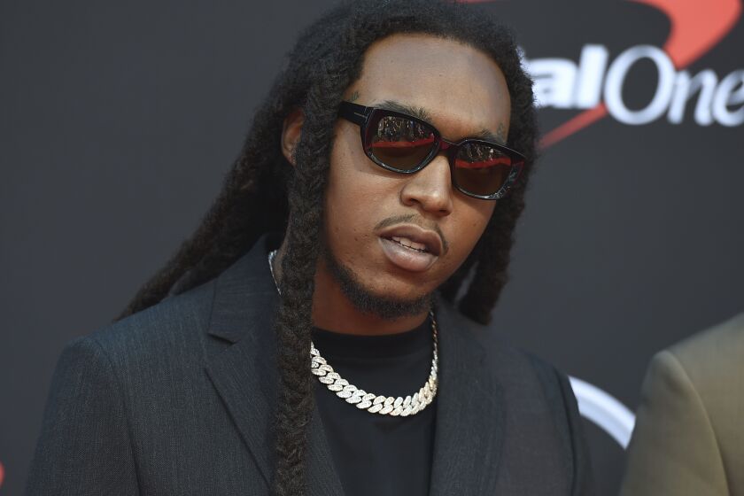 FILE - Takeoff arrives at the ESPY Awards in Los Angeles on July 10, 2019. Authorities said Wednesday, Nov. 30, 2022, that a man who has been accused of illegally having a gun at the time that rapper Takeoff was fatally shot last month outside a private party at a downtown Houston bowling alley has been charged in connection with the case. (Photo by Jordan Strauss/Invision/AP, File)