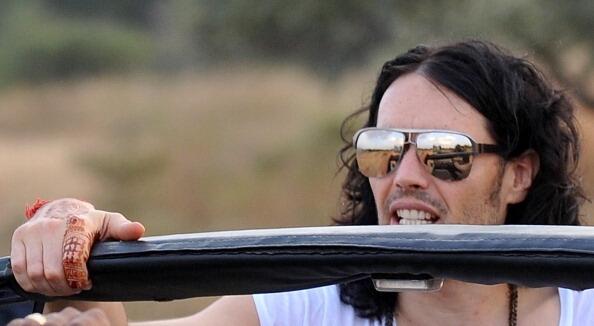 This picture taken on October 22, 2010 shows British comic-turned-Hollywood star Russell Brand on a jungle-safari ride with unidentified guests in Ranthambore National Park in Ranthambore around 200kms from Jaipur. Tight security is in place on October 23 for the pending nuptials between British comic-turned-Hollywood star Russell Brand and US pop star Katy Perry. The couple will reportedly marry in a Hindu ceremony in the Ranthambore tiger reserve in the north Indian state of Rajasthan.