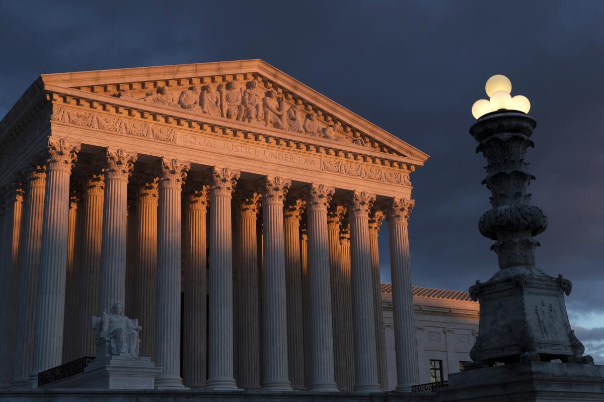 The Supreme Court is seen at sunset in Washington.