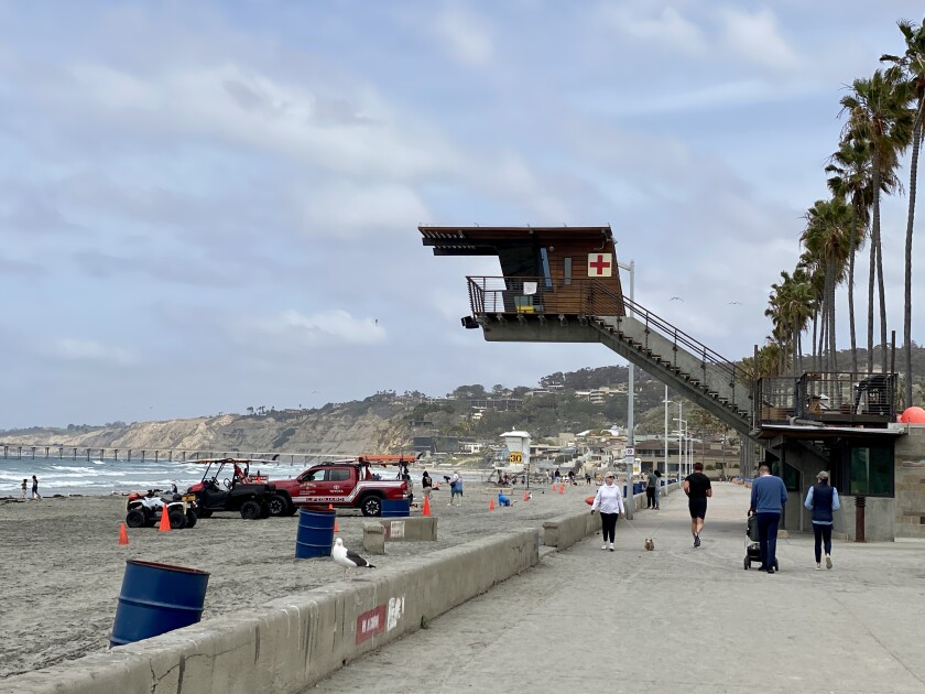 The San Diego Fire-Rescue Department advises beach-goers to set up their gear near a lifeguard station.