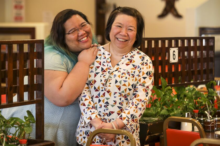 Los Angeles , CA - April 07: Dolly Porsawatdee, 30, left, and her mother Malinee Porsawatdee, 61, at Ocha Classic Restaurant on Thursday, April 7, 2022 that is very popular among Central American and Mexican immigrants in Los Angeles , CA. (Irfan Khan / Los Angeles Times)