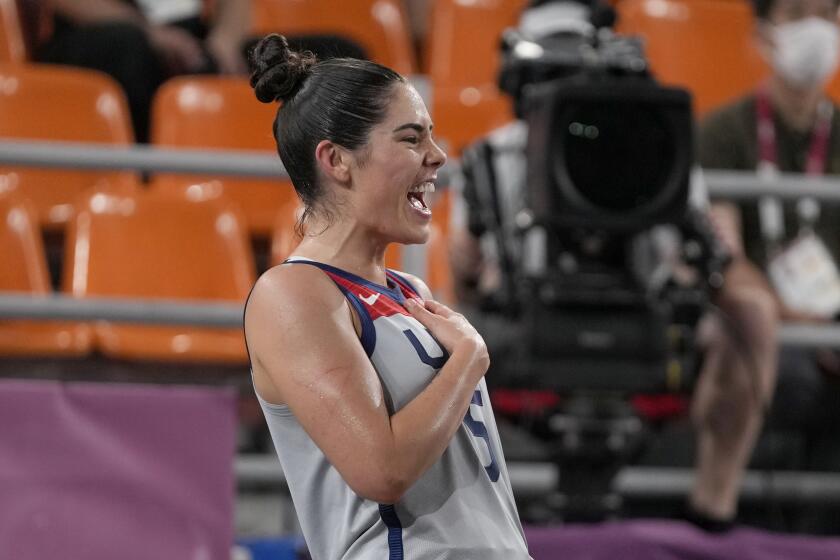 United States' Kelsey Plum celebrates victory over Russian Olympic Committee in a women's 3-on-3 gold medal basketball game at the 2020 Summer Olympics, Wednesday, July 28, 2021, in Tokyo, Japan. (AP Photo/Jeff Roberson)