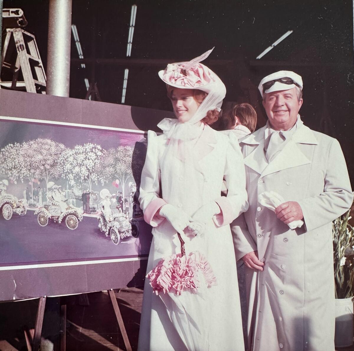 Robin Carr Sanders, left, prepares to ride on the Occidental Life Insurance Company float in 1976.