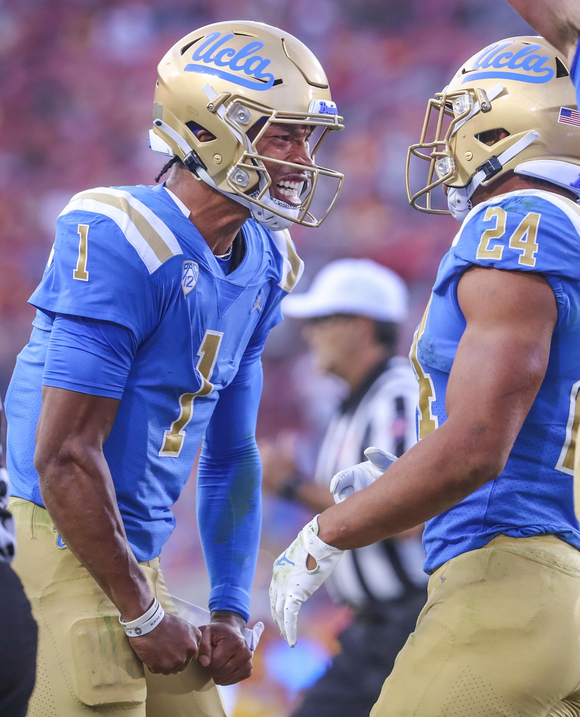 UCLA quarterback Dorian Thompson-Robinson celebrates after a touchdown.