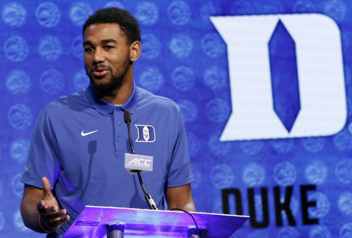 Duke NCAA college basketball player Matt Jones answers a question during the Atlantic Coast Conference media day in Charlotte, N.C., Wednesday, Oct., 26, 2016. (AP Photo/Bob Leverone)