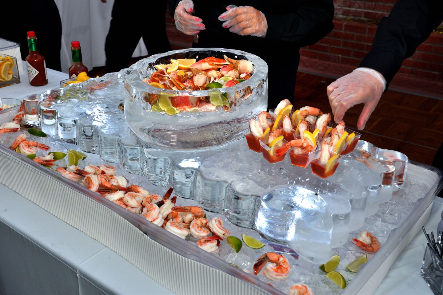 Guests dig into the seafood bar at the 75th Jewel Ball.