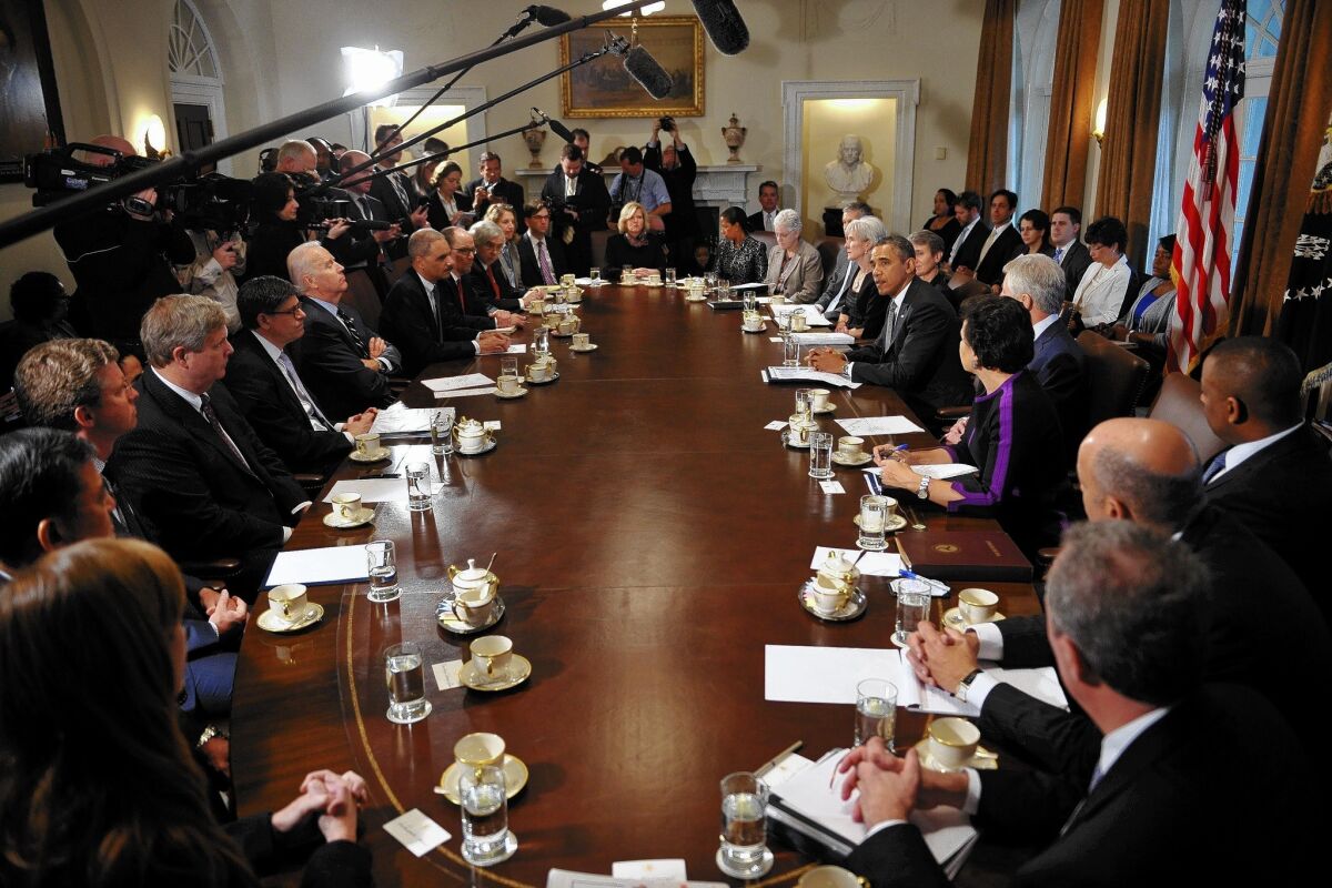 President Obama speaks during a Cabinet meeting. The president's job approval rating has fallen to the 40% range, suggesting many voters do not feel they've benefited from the economy's steady growth.