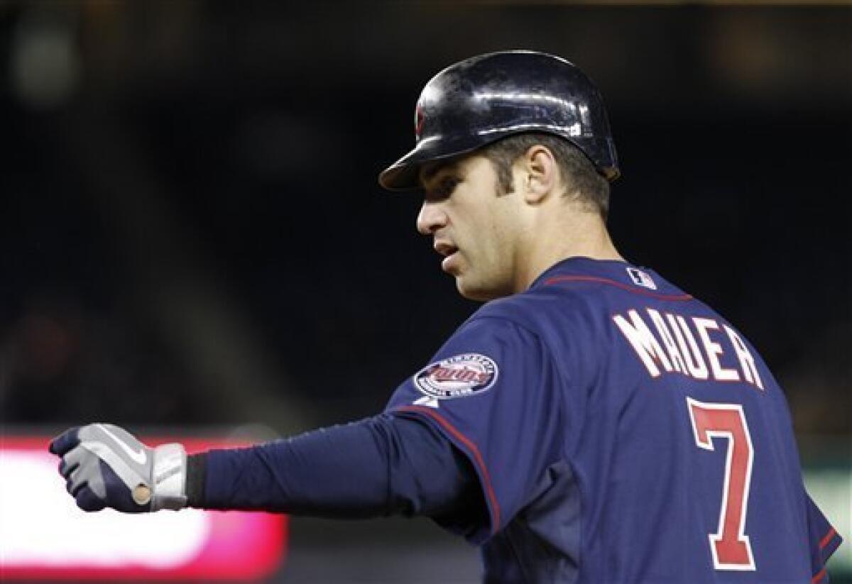 Joe Mauer doubles, catches in Twins finale