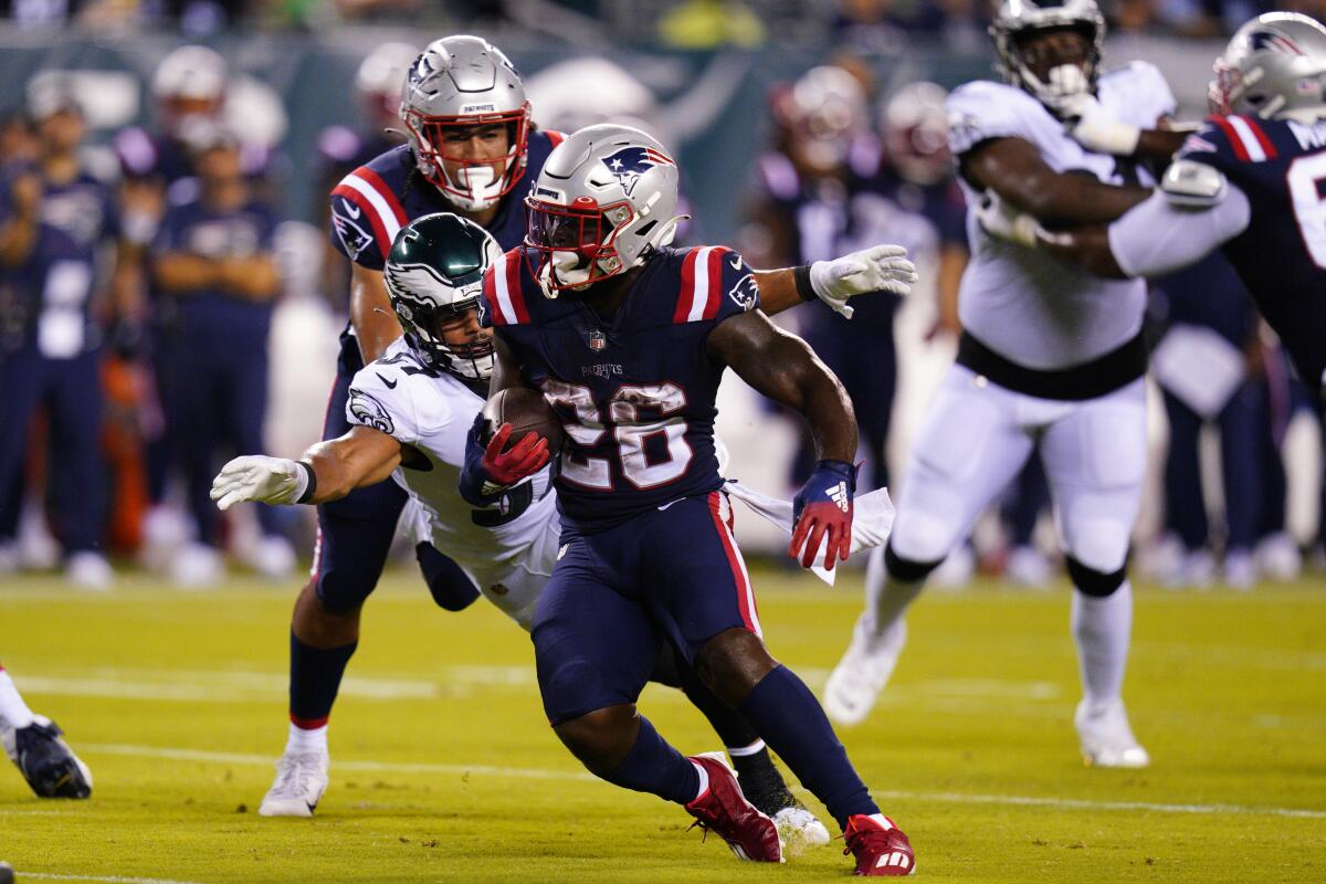 New England Patriots running back Sony Michel carries the ball during a preseason game.