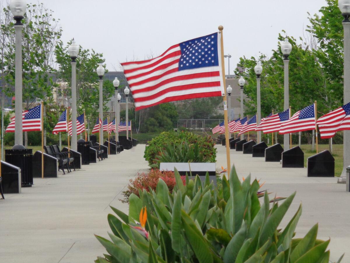 Flags for our Heroes” placed along Ocean Drive