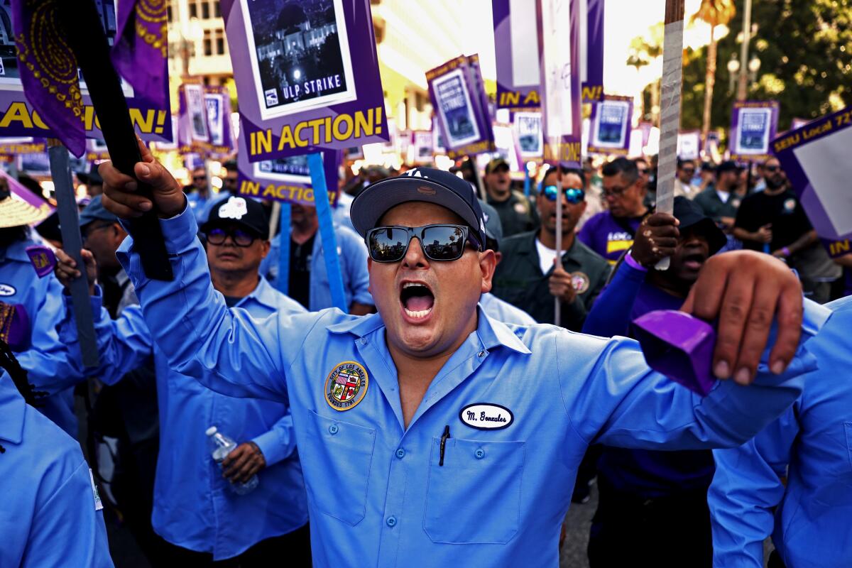 Los Angeles city workers protest at City Hall during a one-day strike.