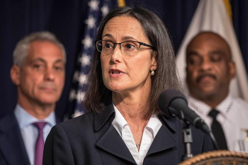 Illinois Attorney General Lisa Madigan, accompanied by Chicago Mayor Rahm Emanuel, left, and Police Superintendent Eddie Johnson speaks at a news conference Tuesday, Aug. 29, 2017 in Chicago. Madigan filed a lawsuit Tuesday seeking federal court oversight over the Chicago Police Department. Chicago is changing course and now wants to implement reforms of its police department under federal court supervision.(Rich Hein/Sun Times via AP)