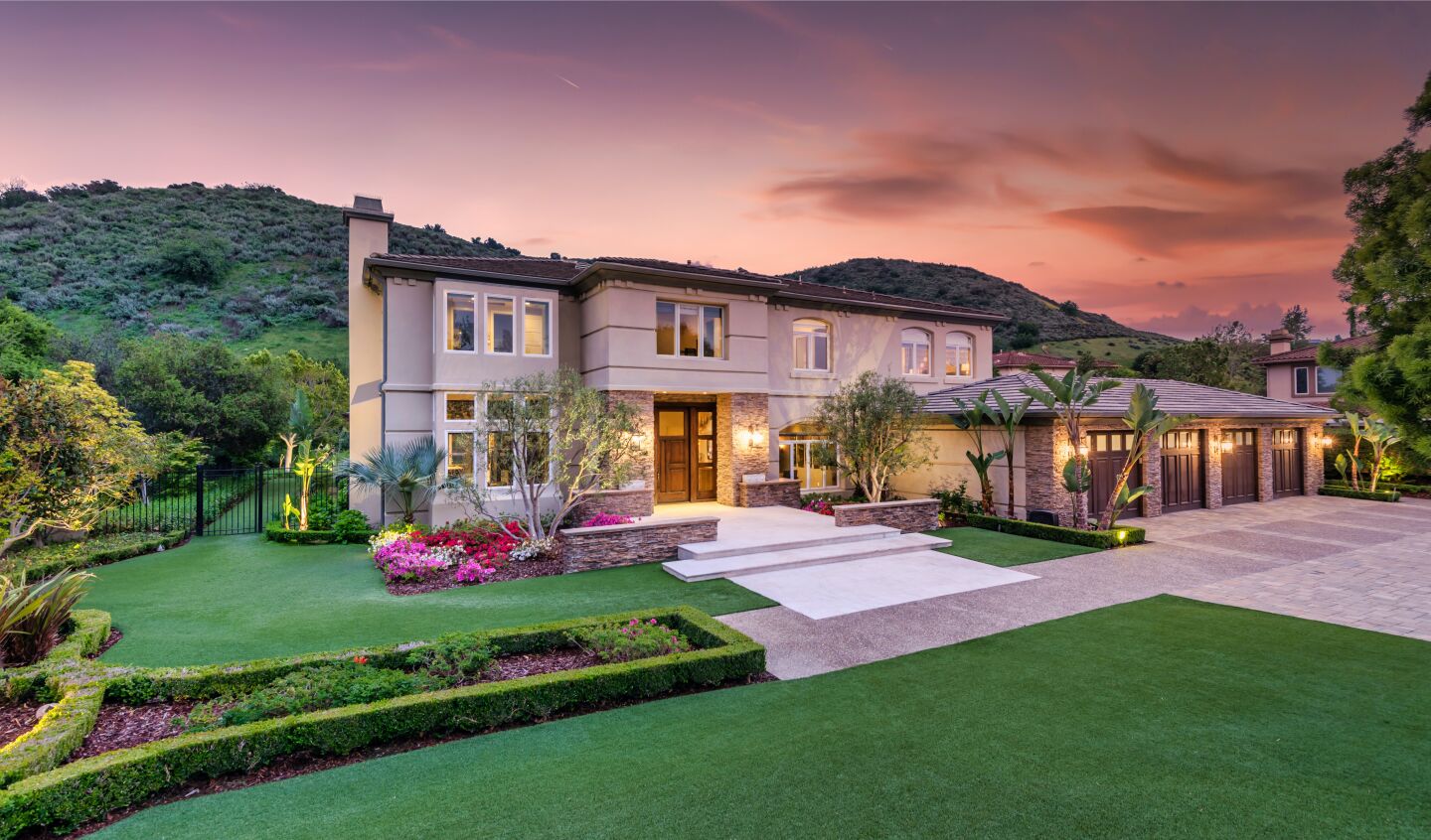 Set on an acre, the private compound includes a 7,000-square-foot home, basketball court, billiards room and swimming pool.