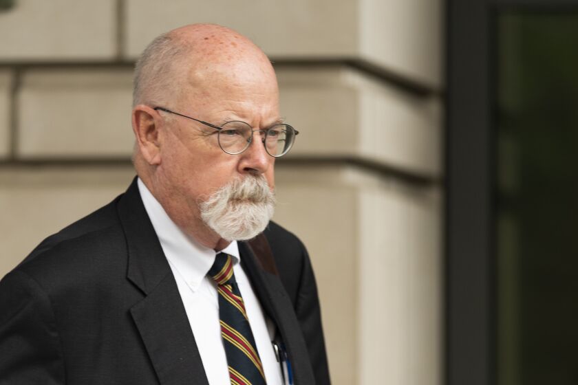 FILE - Special counsel John Durham, the prosecutor appointed to investigate potential government wrongdoing in the early days of the Trump-Russia probe, leaves federal court in Washington, May 16, 2022. Durham ended his four-year investigation into possible FBI misconduct in its probe of ties between Russia and Donald Trump’s 2016 presidential campaign. The report Monday, May 15, 2023, from Durham offers withering criticism of the bureau but a meager court record that fell far short of the former president’s prediction he would uncover the “crime of the century.” (AP Photo/Manuel Balce Ceneta, File)