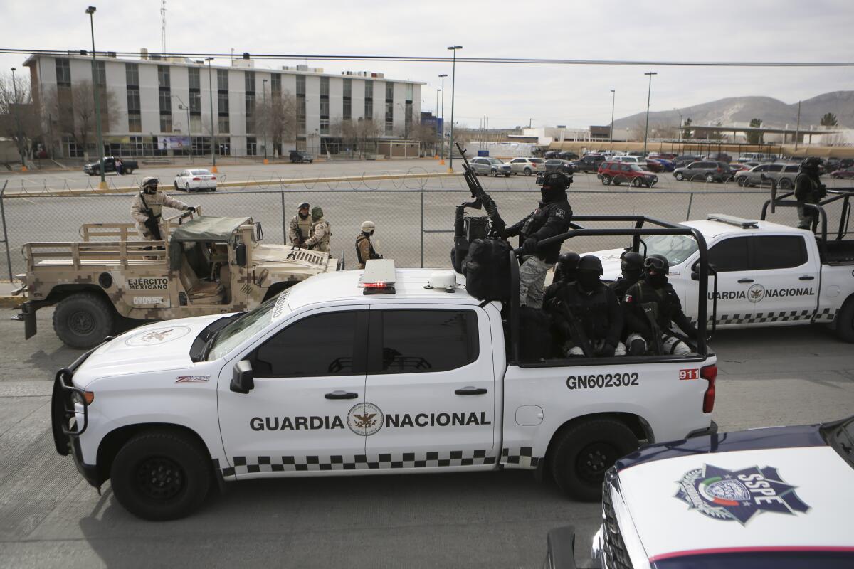 Mexican National Guard outside a state prison in Ciudad Juarez, Mexico.  